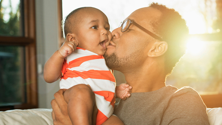 Black father and baby.