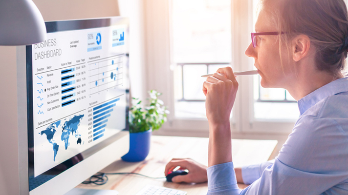 Executive looking at dashboard analytics.