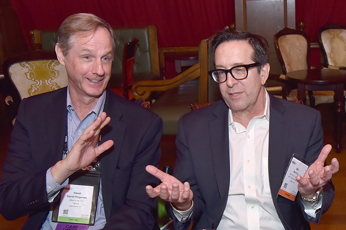 David Fitzgerald of CVS Health and Bill Fox of MarkLogic, take part in a lively discussion of healthcare during lunch at HIMSS19. Photo by Jann Hendry Photography