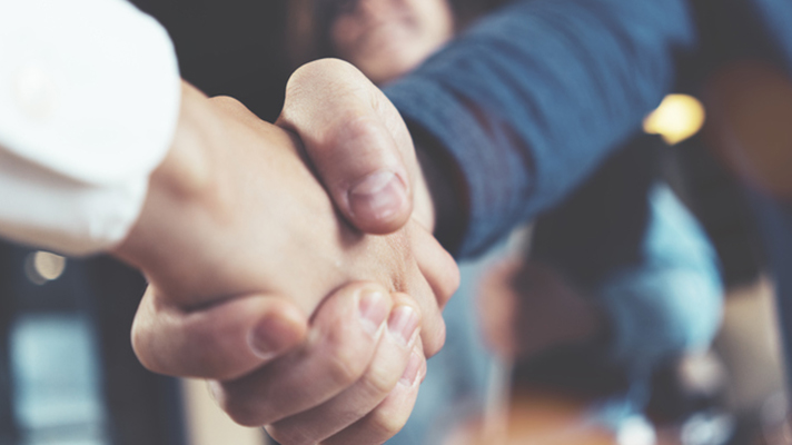 Community members shaking hands.