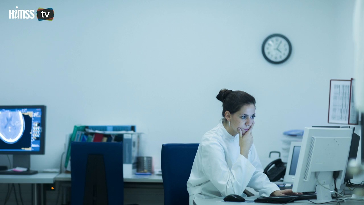 Healthcare worker looking at a computer