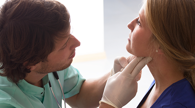 Doctor treating patient.