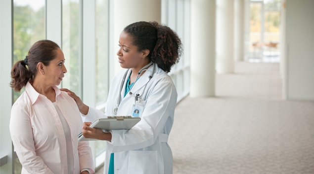 doctor talking to patient