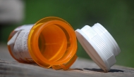 Empty pill bottle lying on side