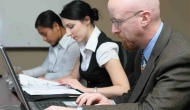 Three people working