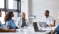 Medical professionals at conference table