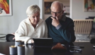 Two people at a laptop