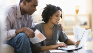 Couple looking at medical bills