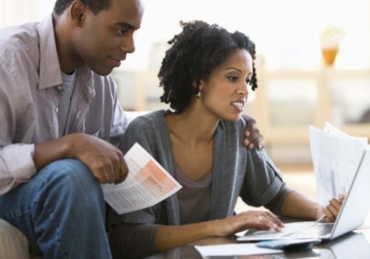 Couple examining paperwork