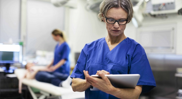 Doctor using tablet